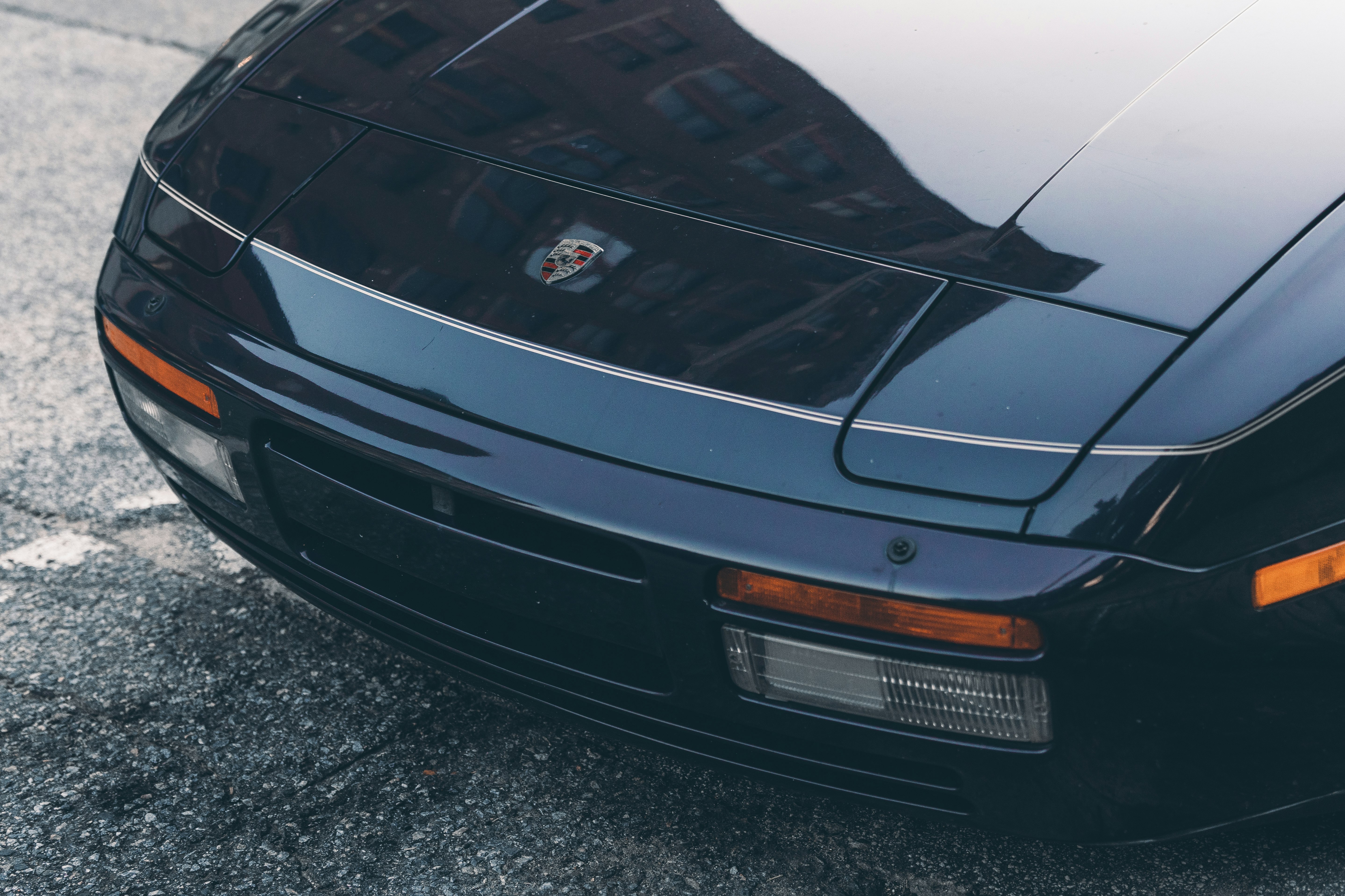 black bmw car on gray asphalt road during daytime